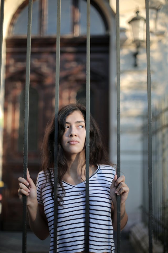 Woman behind bars